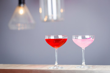 Red Strawberry Cocktail and Pink Rose Cocktail on the Wooden Table, Free Space for Text, Horizontal Wallpaper