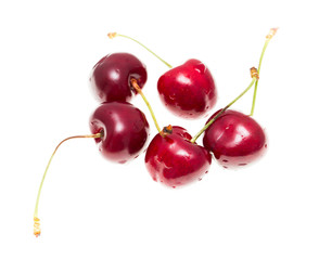 Juicy red cherry on a white background