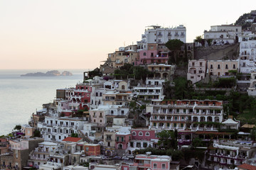 Fototapeta na wymiar Positano coast - view from hillside with villas and boats on sea