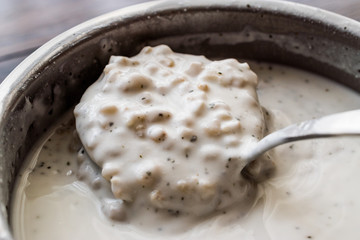 Cold Yogurt Soup with wheat in the ladle