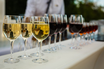Glasses with wine on a buffet table
