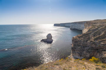  Rocky sea beach / Seascape with rocky cliffs by the sea