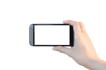 Female hand holding a phone with blank screen isolated on white.