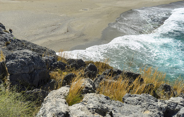 Solitary beach with waves in Creta