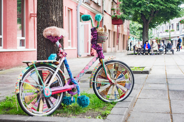 Fototapeta premium Colorful bicycle with knitted metallic details