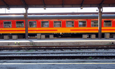 Colorful train wagon in station