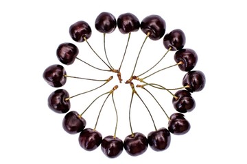 A lot of ripe red cherries isolated on a white background