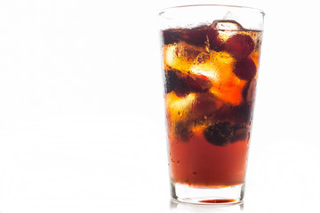 Refreshing cold cherry cola isolated on a white background