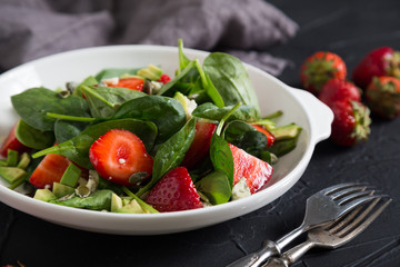 Salad with spinach fresh strawberries and cheese