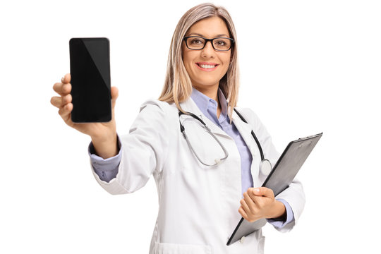 Female Doctor With A Clipboard Showing A Phone