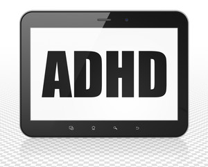Health concept: Tablet Pc Computer with ADHD on display