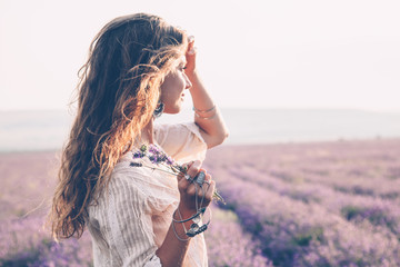 Boho styled model in lavender field