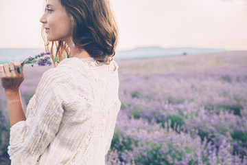 Boho styled model in lavender field