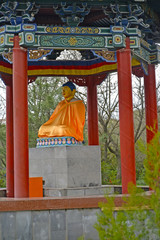 Buddha Shakyamuni's statue in a rotunda arbor. Elista, Kalmykia