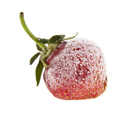 Frozen strawberries isolated on white background close-up