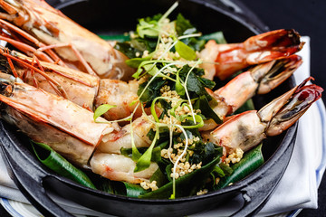 Royal prawns served with herbs and quinoa.