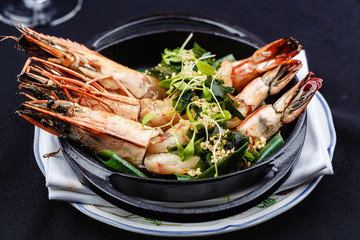 Royal prawns served with herbs and quinoa.