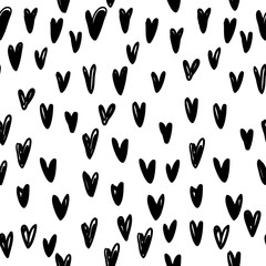 Simple seamless pattern with black hearts pattern for a holiday drawn by hand
