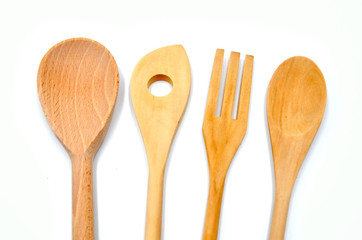 wooden cooking spoons on white background