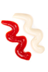 Tomato ketchup and mayonnaise isolated on white background. Top view
