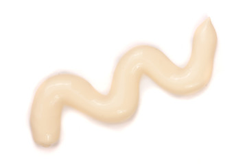 Mayonnaise isolated on a white background close-up. Top view
