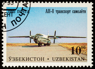Transport plane Antonov AN-8 on postage stamp