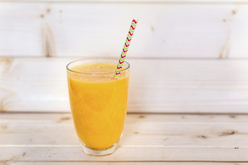 orange smoothie with  carrots and grapefruit . Healthy life concept.