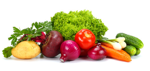 Obraz na płótnie Canvas Assortment of fresh raw vegetables isolated on white background. Tomato, cucumber, onion, salad, carrot, beetroot, potato