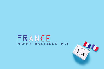 14 july Wooden calendar and Happy Bastille Day. Concept National Day France,Copy space,minimal style