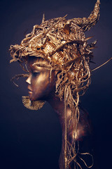 Mannequin in golden hat