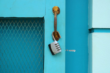 padlock on blue door