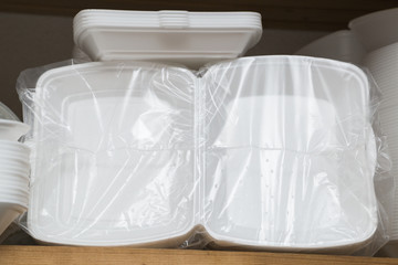 Fototapeta na wymiar Plastic boxes, packing or plates packed in plastic bags
