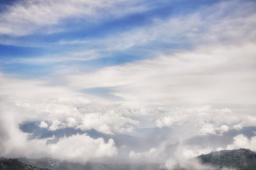 Top view of mountain with cloud and blue sky in Sikkim, India