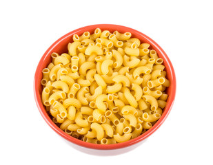 bowl of dried pasta or elbow pasta over white background