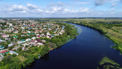 Fototapeta premium Top view of river Matyra and Gruazy town in Russia