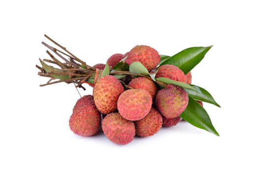 bunch of fresh Lychees with leaves and stem on white background