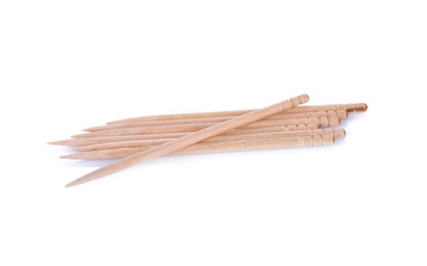 pile of toothpicks on white background