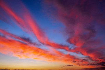 Naklejka na ściany i meble Fiery, orange and red colors sunset sky. Beautiful background