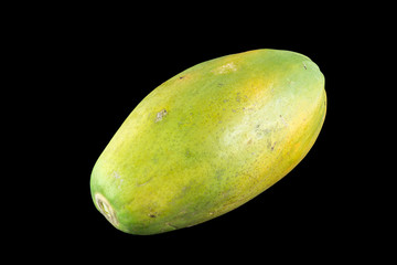 Papaya on black background .
