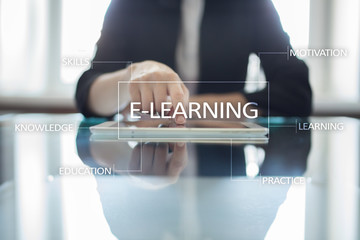 E-Learning on the virtual screen. Internet education concept.