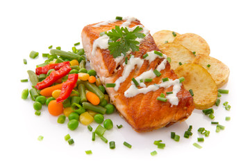 Salmon Steak with Vegetables and fried potatoes.