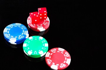 High angle view of red dices with chips