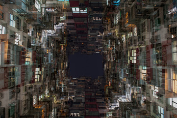 Traditional Hong Kong apartment building under double exposure