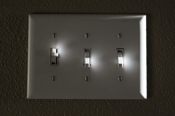 Light or Power Switch on Wall Highlights On and Off