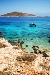 Turquoise waters exceptionally strong colors and sharp rocks that surround it