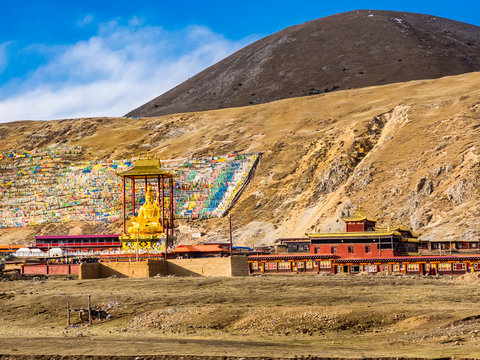View of Seated Buddha Statue in Buddhist Tibetan Monastery in Sichuan