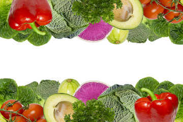 Frame of fresh vegetables.Paprika,tomatoes,avocado,green leaves,cabbage,parsley.Place for text.Healthy food, diet consept