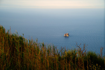 Strombolicchio (small Stromboli), rest of an old volcanic vent filling (volcanic plug) from another...