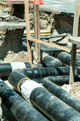 Replacing hot water pipeline down the street in the city before winter heating season come....