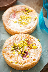 Cherry shortcrust pastries with pistachio nuts 
